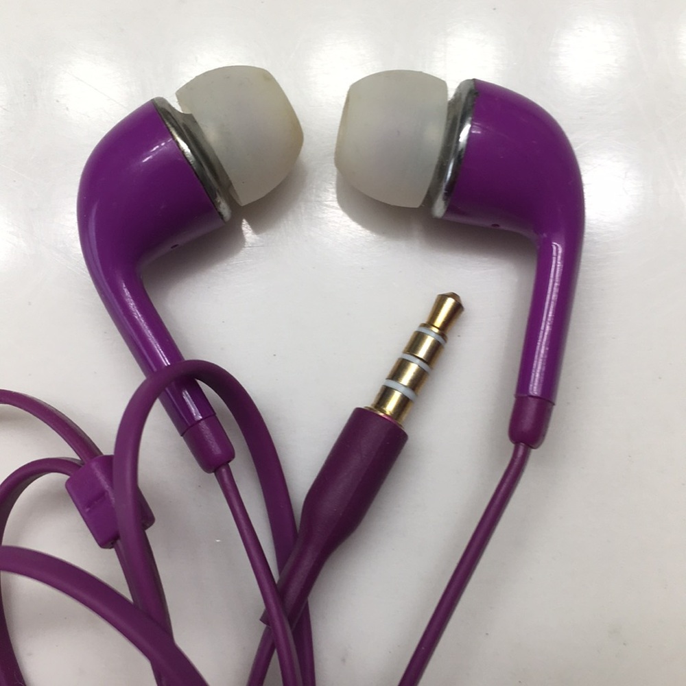 Purple wired earbuds headphones